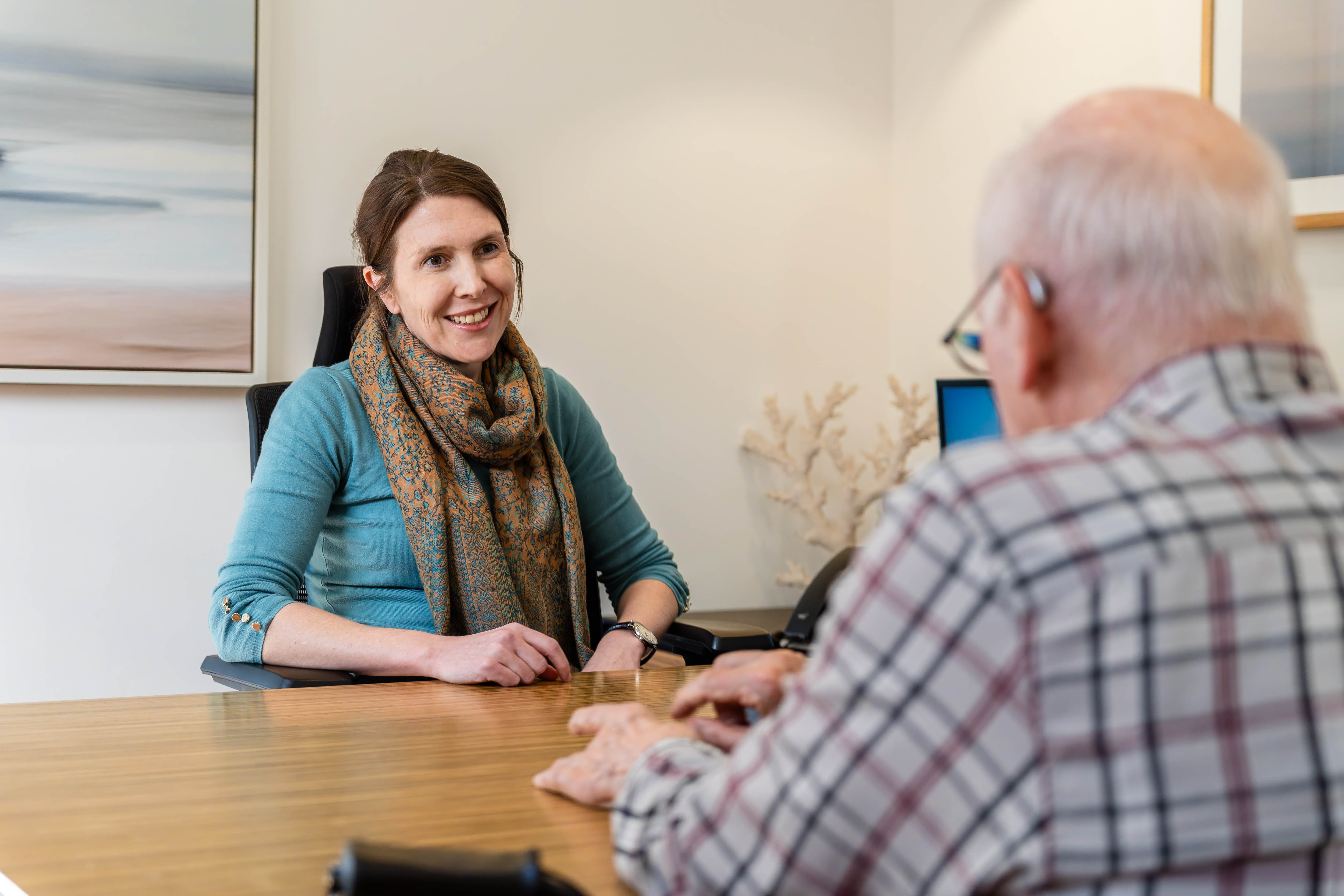 Dr Tess Tonkin smiling during a consultation